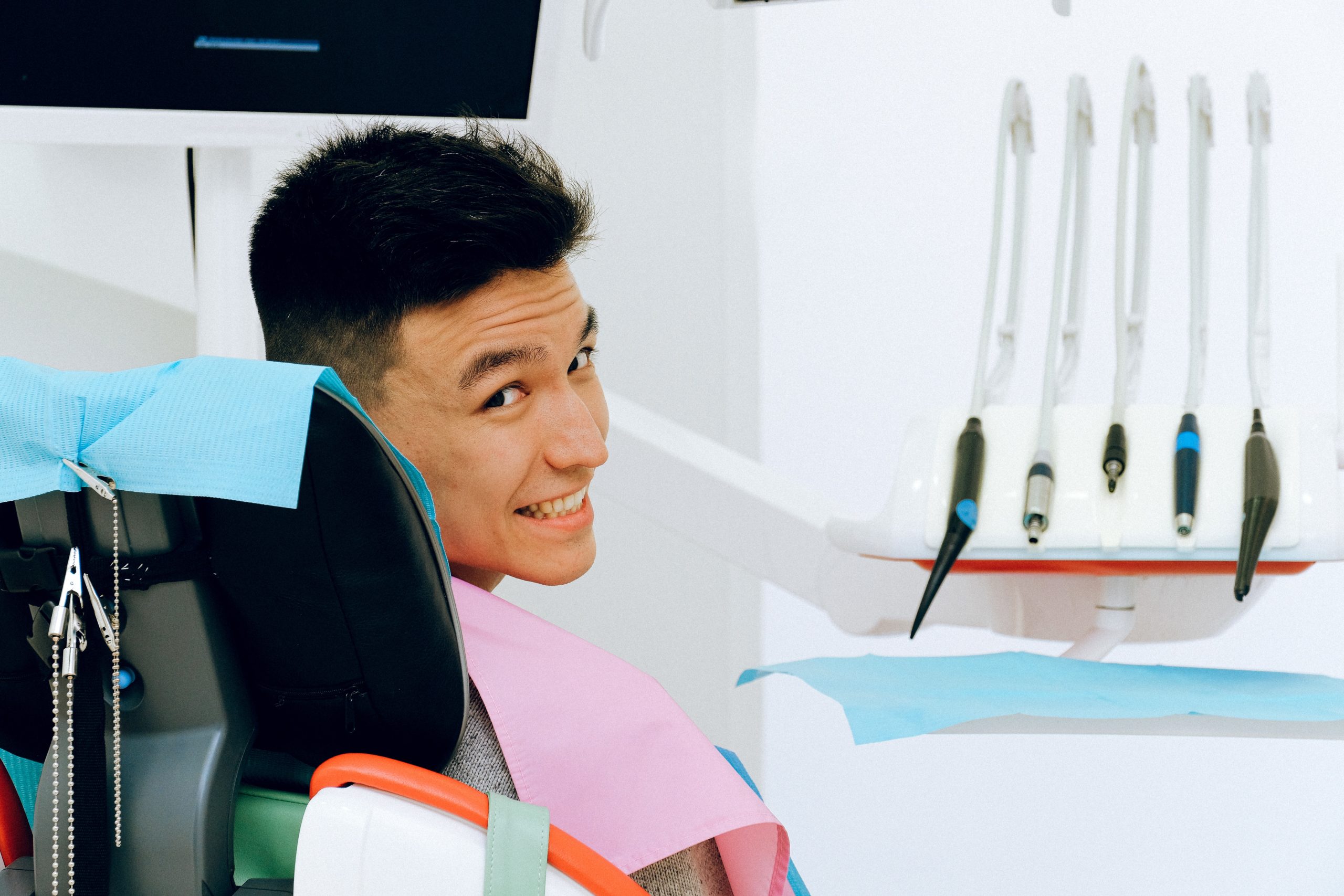Happy patient in dental chair at Boulder Smile Design - new patients welcome!